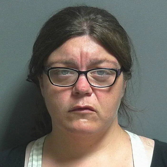 Linton woman accused of intimidation of one man, battery on another