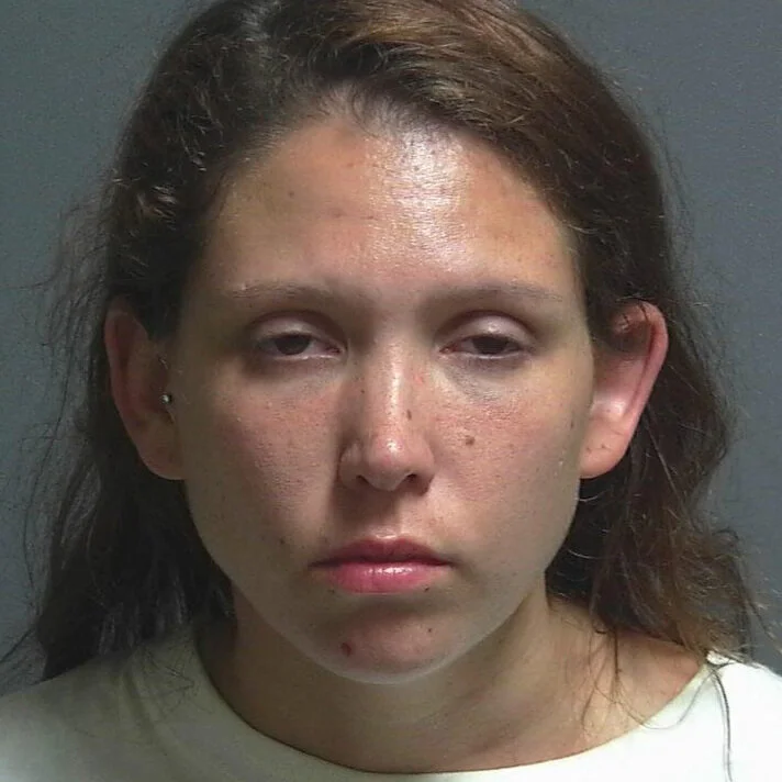 Woman accused of heroin possession
