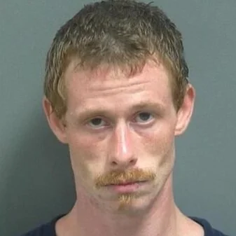 With officers at the front door, Bloomfield man runs out the back