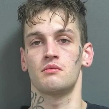 Driver found unresponsive in crashed vehicle was arrested on drug charges 