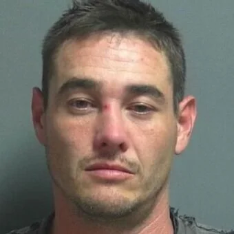 Brazil man charged with OVWI after crash near Switz City
