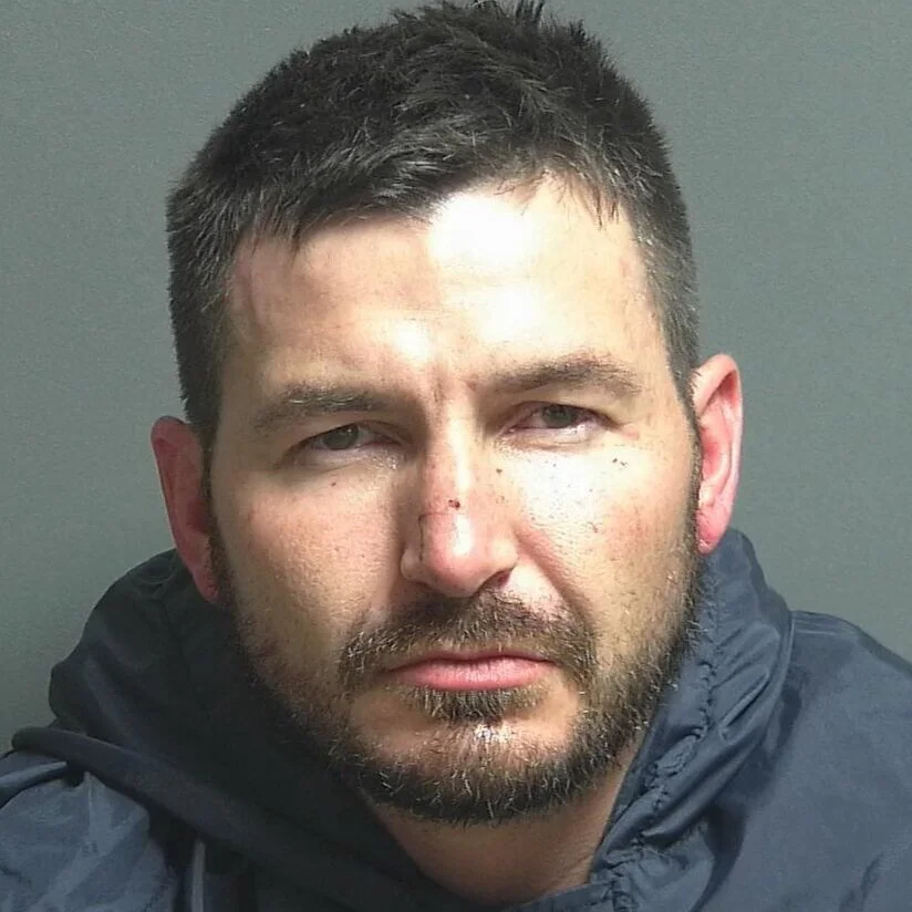 Fleeing Jeep crashes into pond, driver found hiding in tall grass