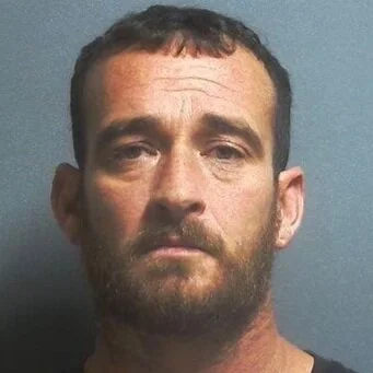 Officer kicks in door to arrest suspect