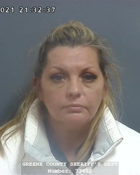Indianapolis woman arrested after rattling doors and banging on windows