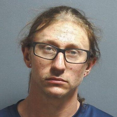 Man arrested and charged with child molesting after failing polygraph