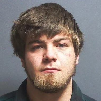 Gunning it over railroad tracks leads to crash then jail