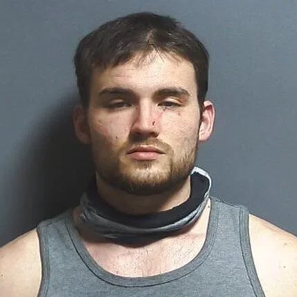 Angry man threatened to kill several people then hid under a bed