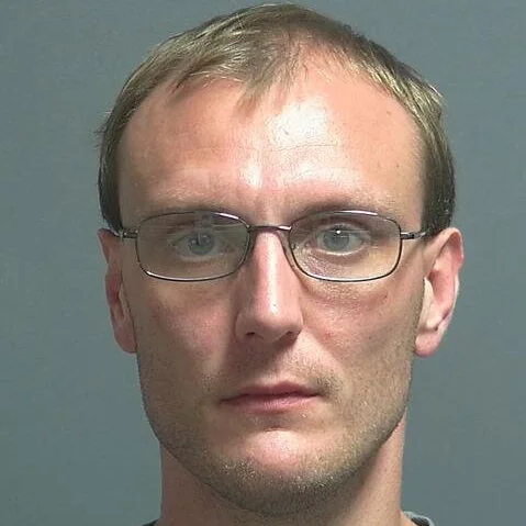 Witnesses say they heard man threaten to slit neighbor’s throat