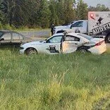 Elsewhere: Trooper injured after car falls from trailer and collides with police cruiser