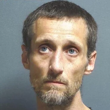 Bicycle rider accused of threatening to blow a man’s head off