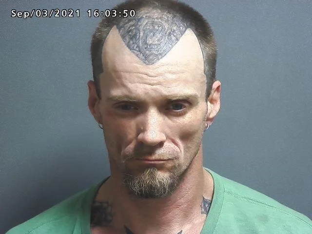 Worthington man accused of stashing meth pipes in his socks and a syringe in his pocket