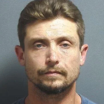Suspect showed up at the police station and was arrested
