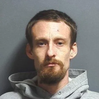 Bloomfield man accused of sticking knife in woman’s door