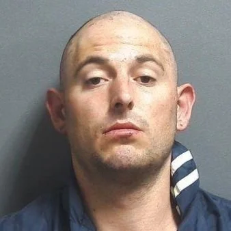 Uncooperative man arrested north of Switz City with a stolen vehicle nearby