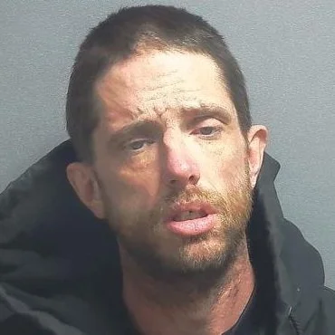 Man found passed out in a car in front of a store in eastern Greene County arrested on drug charges
