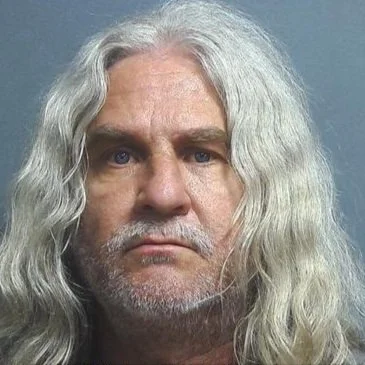 “Gliding” through a stop sign leads to traffic stop then arrest