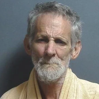 Driver arrested after fishtailing and crashing through a fence