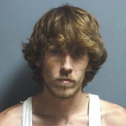 Motorcycle stolen then ditched in the roadway; suspect detained by citizens until police arrived