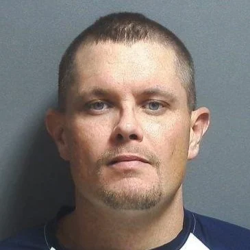 JPD officers find suspect hiding in vehicle