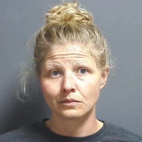 UPDATE, ARRESTED: Warrant issued for arrest of woman accused of beating man in front of a child