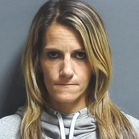 Woman arrested on charges of theft and forgery