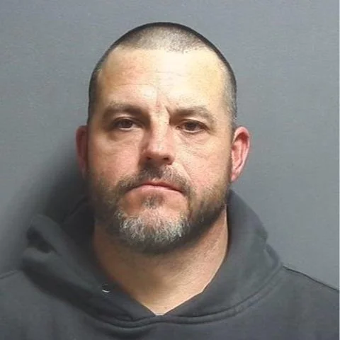 Driver arrested after crashing into neighbor's house