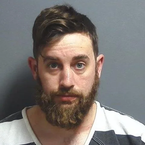 Linton man arrested, accused of hitting ex-girlfriend in a bar