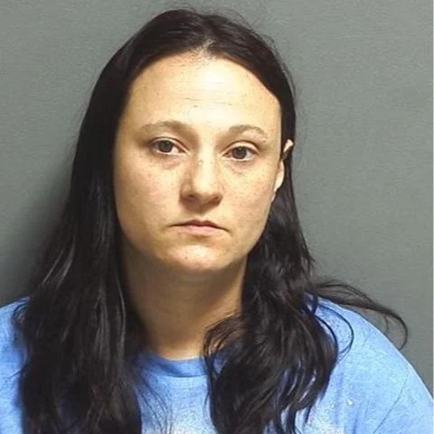 Mother charged with neglect after child found wandering in a nearby parking lot