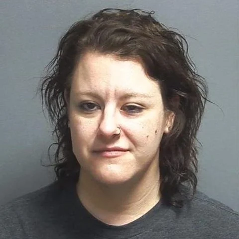 Woman slumped behind the wheel arrested on drug charge