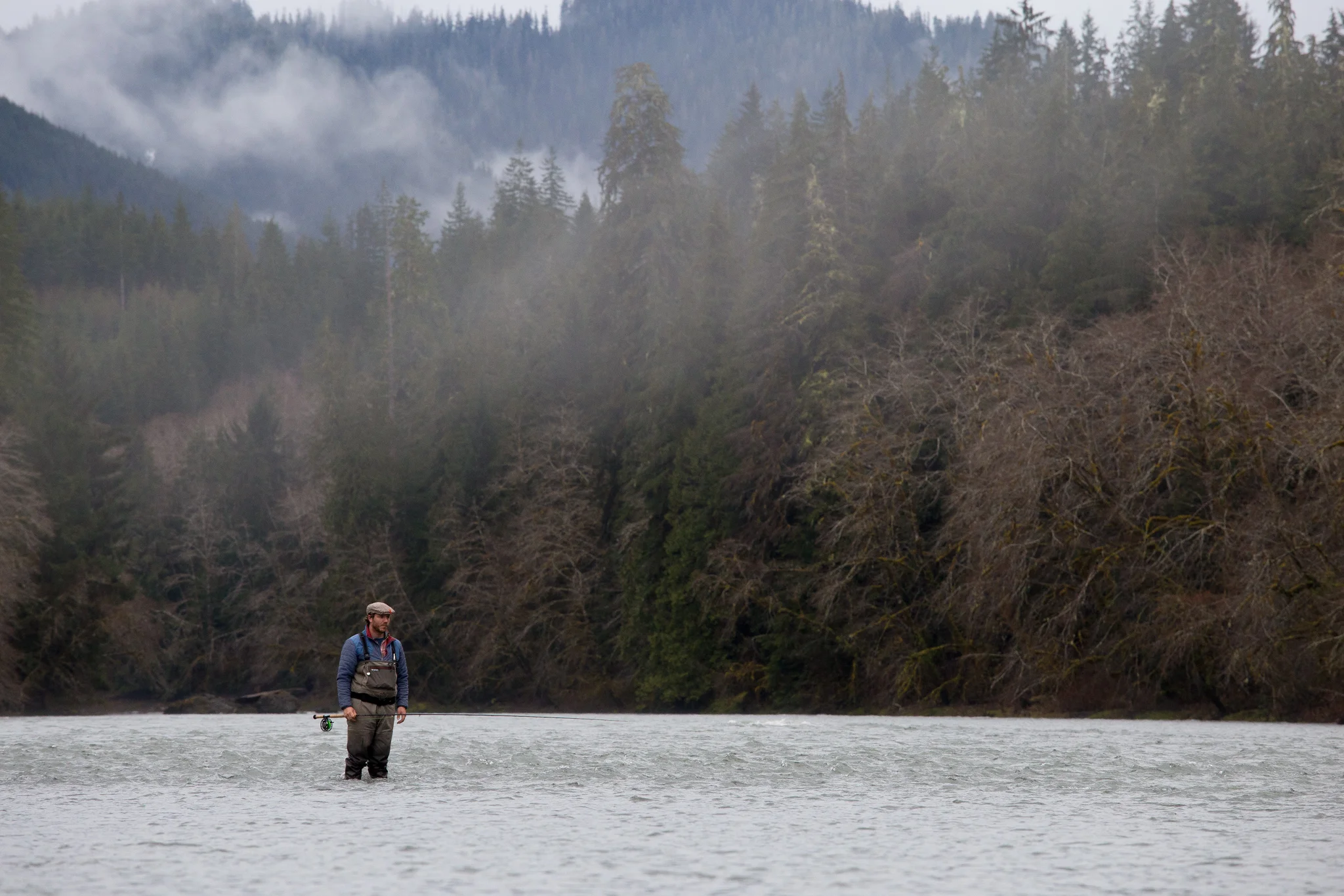 Fly fishing for steelhead amidst the coastal rainforest. photo Reid Curry.