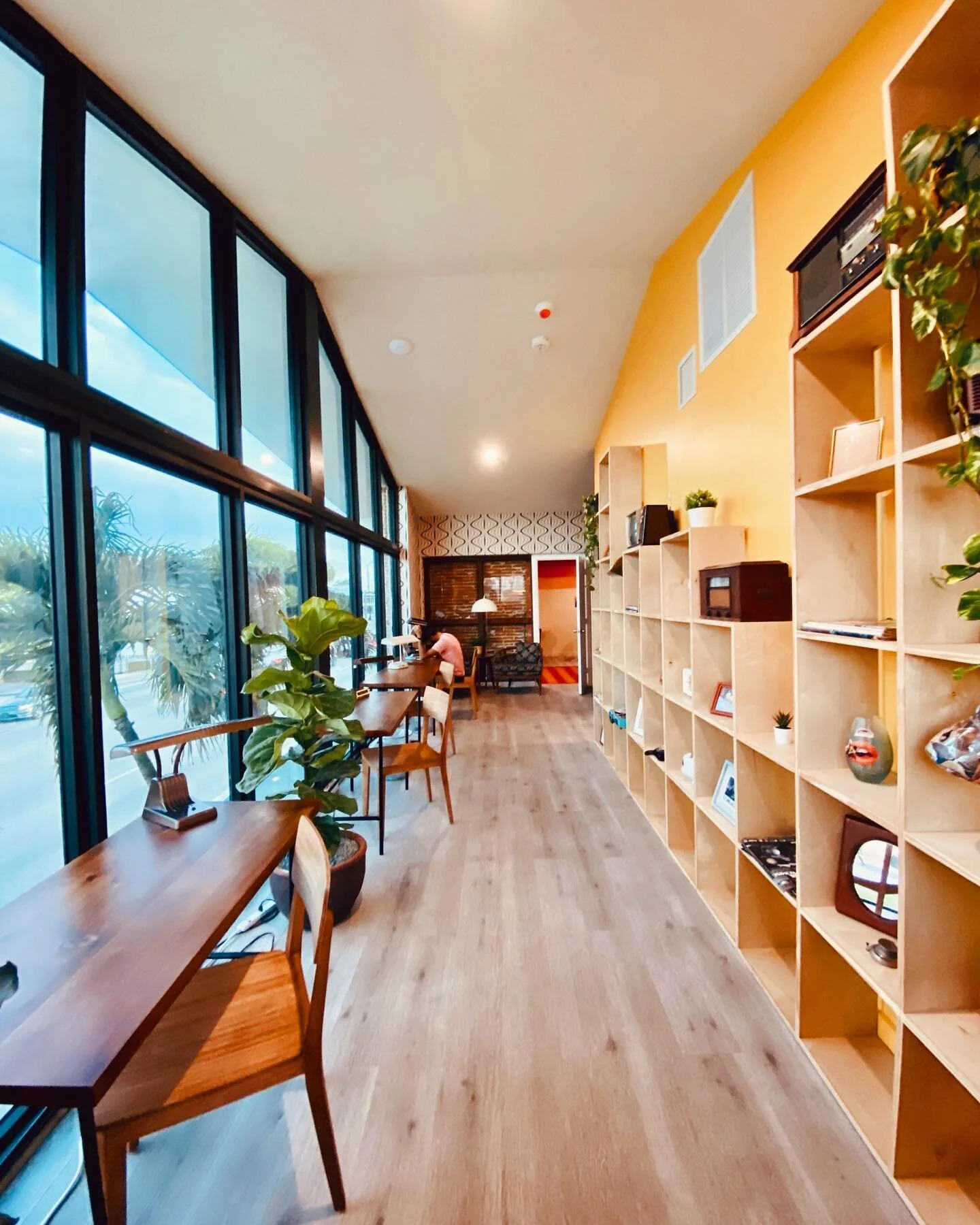 My favorite space at the #GoldDust motel ✨ because we brought back this historic custom storefront, the room gets tons of daylight - even on a rainy day.