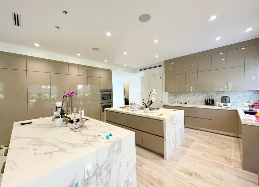 #Swipe to see the before. The second island is where the wall used to be. We had to relocate electrical, mechanical, plumbing,fix flooring,ceiling and more - but it was well worth it for the magnificent result.