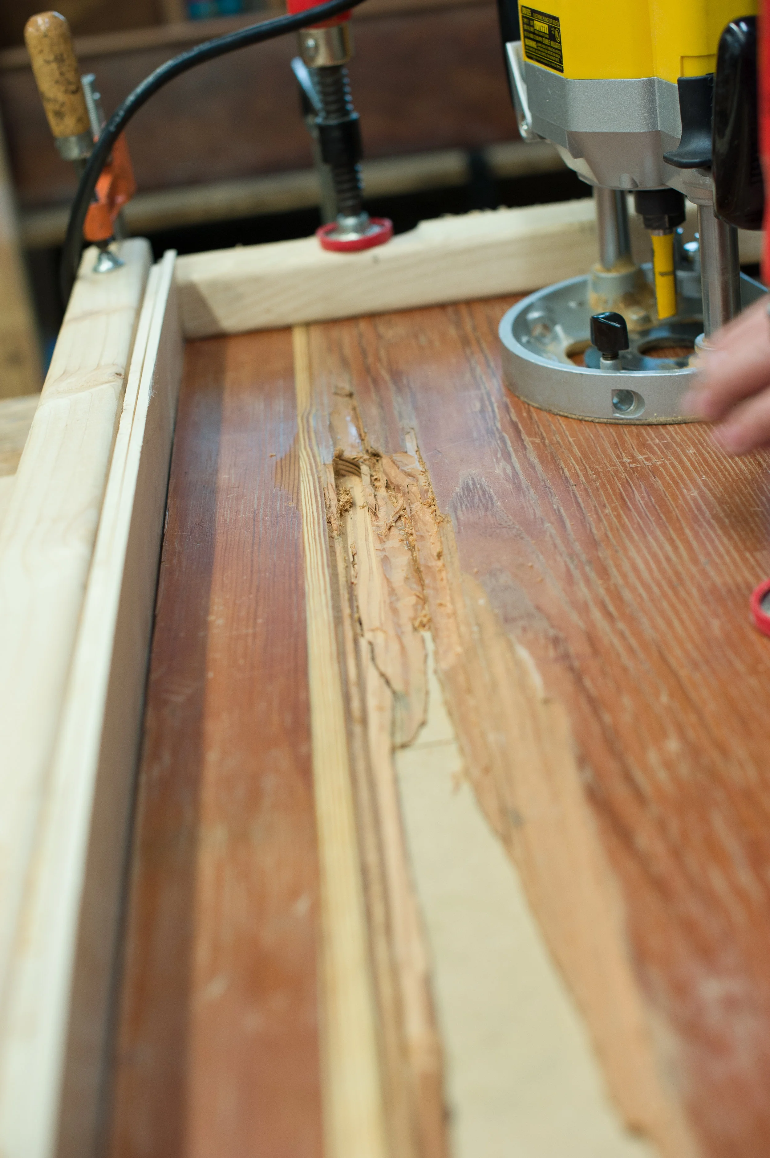 Door panel prepared to rout substrate.