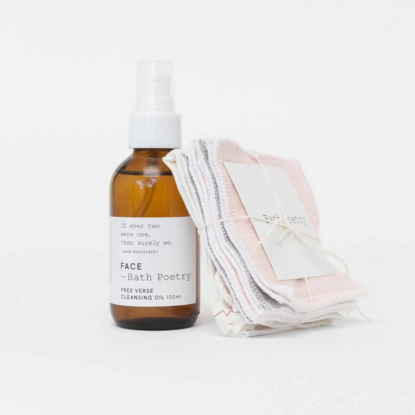 A match made in heaven. Free Verse Cleansing Oil and reusable facial squares made of organic bamboo flannel. Lemon, chamomile, sweet almond and jojoba oils leave skin clean and nourished. Available at bathpoetry.com.

Image description: An amber bott