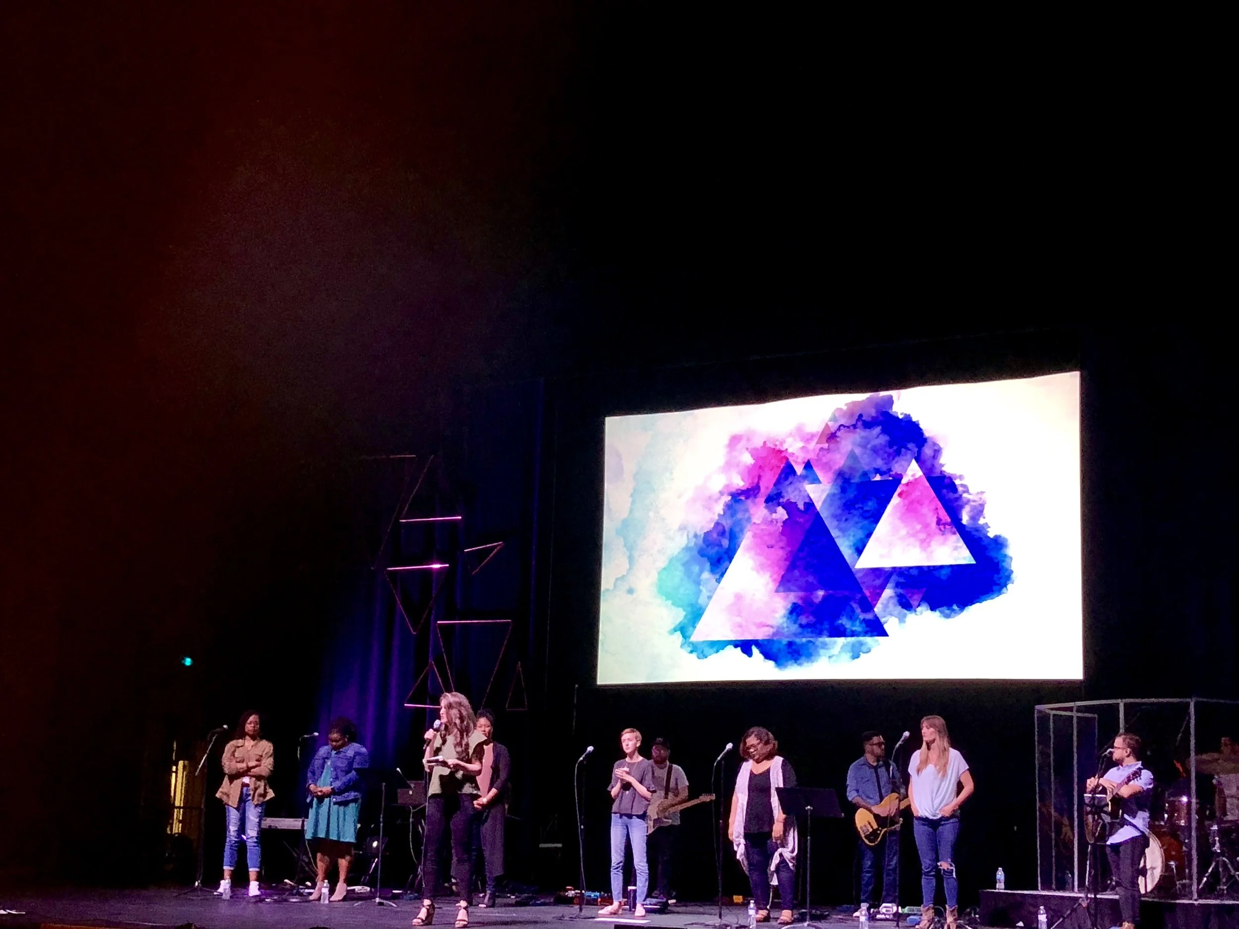 This worship team was so incredible. And here is a photo of our friend Jenn Jett reading from 1 John at the beginning of day 2. 