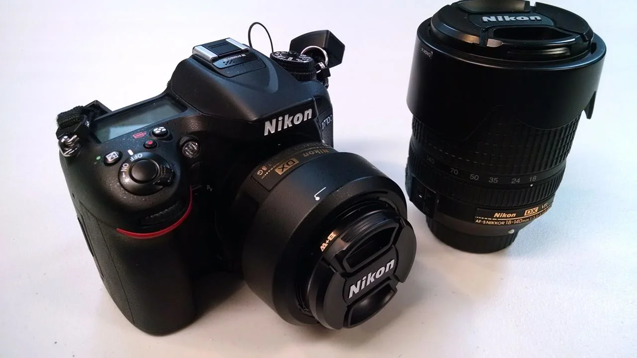 My current kit, a Nikon D7100 w/ 35mm f1.8 and 18-140mm zoom