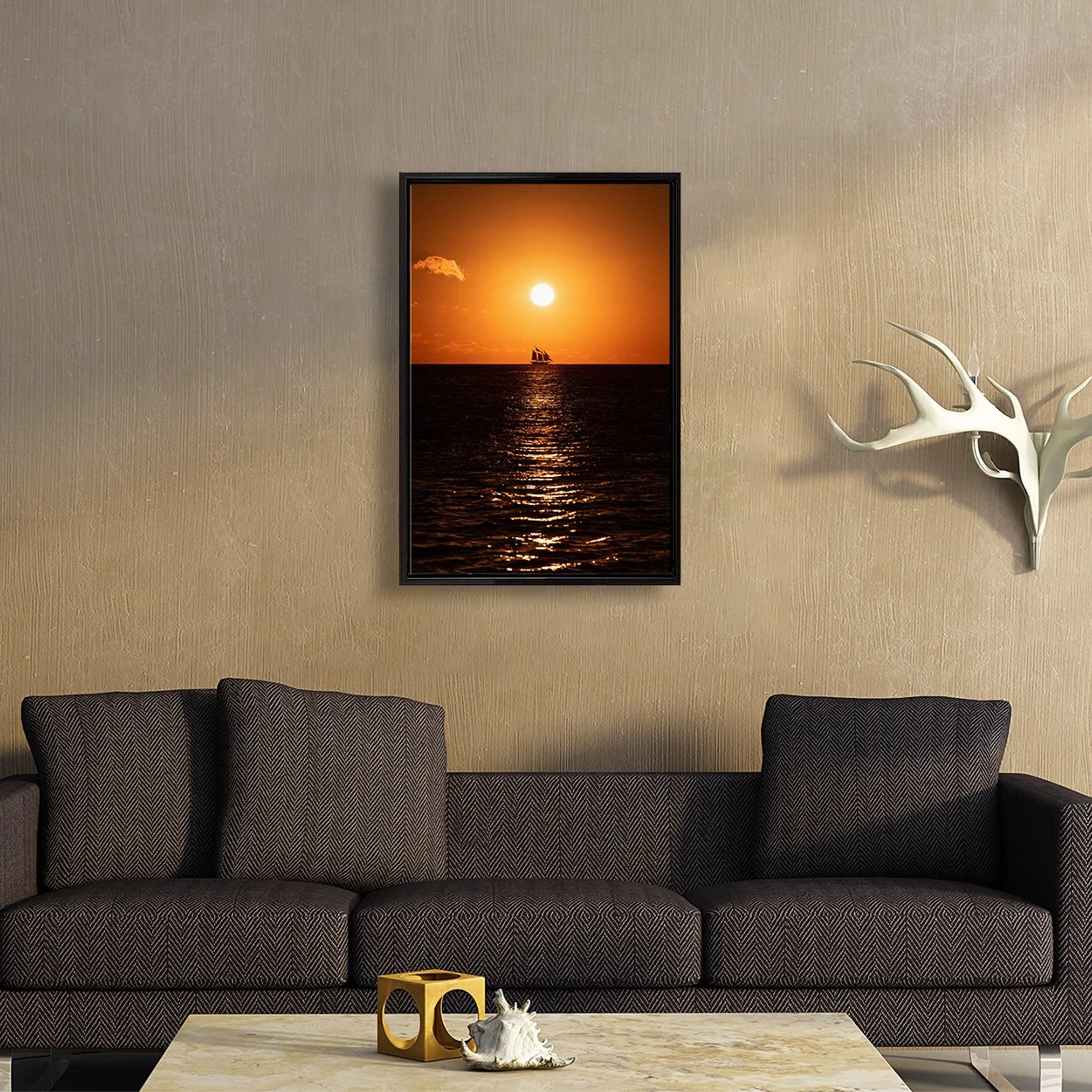 20"x30" canvas print in black wood floating frame on living room wall above coach.  Print of a schooner sailing in Key West Harbor at sunset.