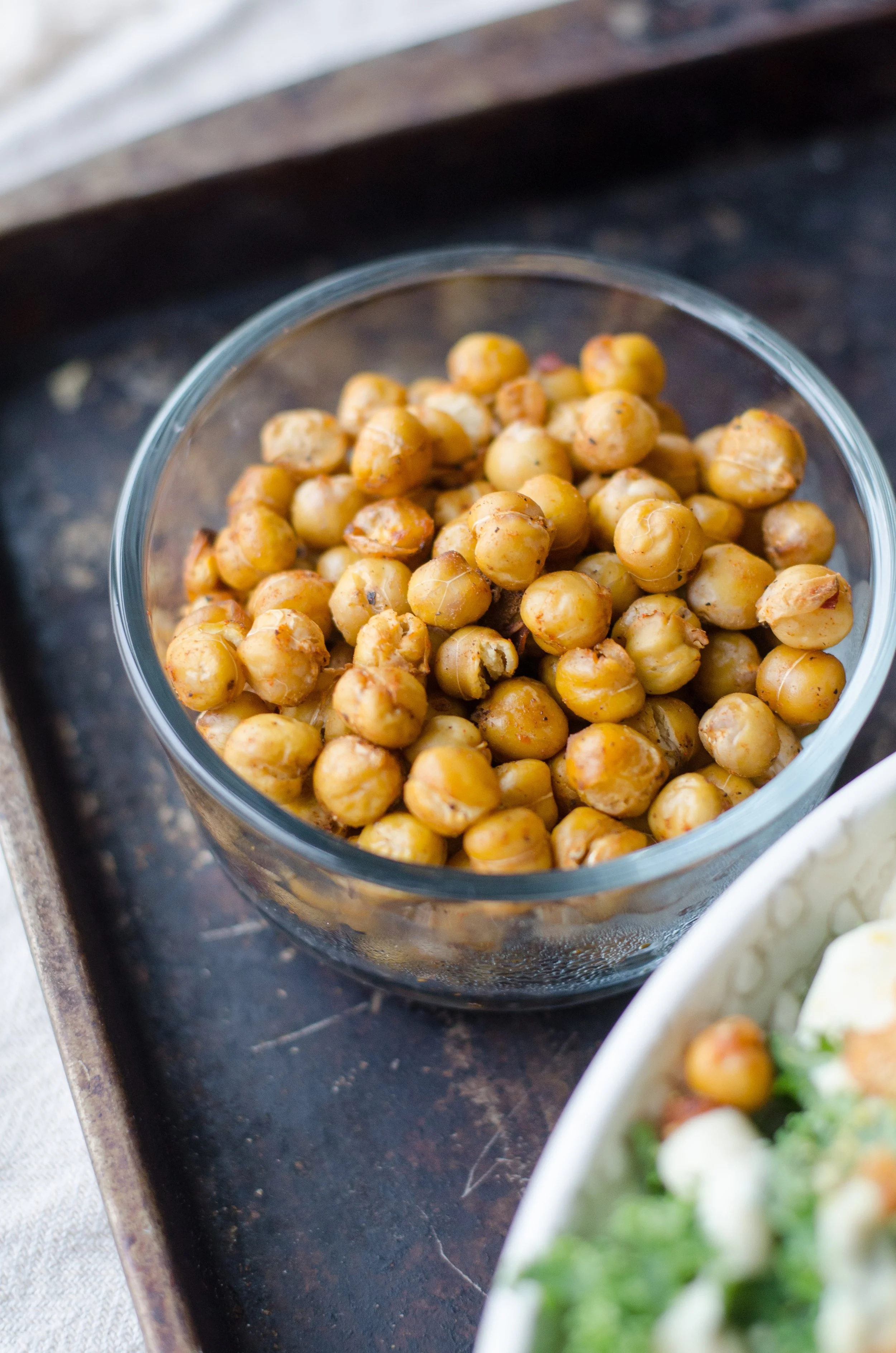 These tiny crispy beans should really be the new bar nuts. Two cans of chickpeas and about 20 minutes will yield addictively salty crispy bites. So what are you waiting for?