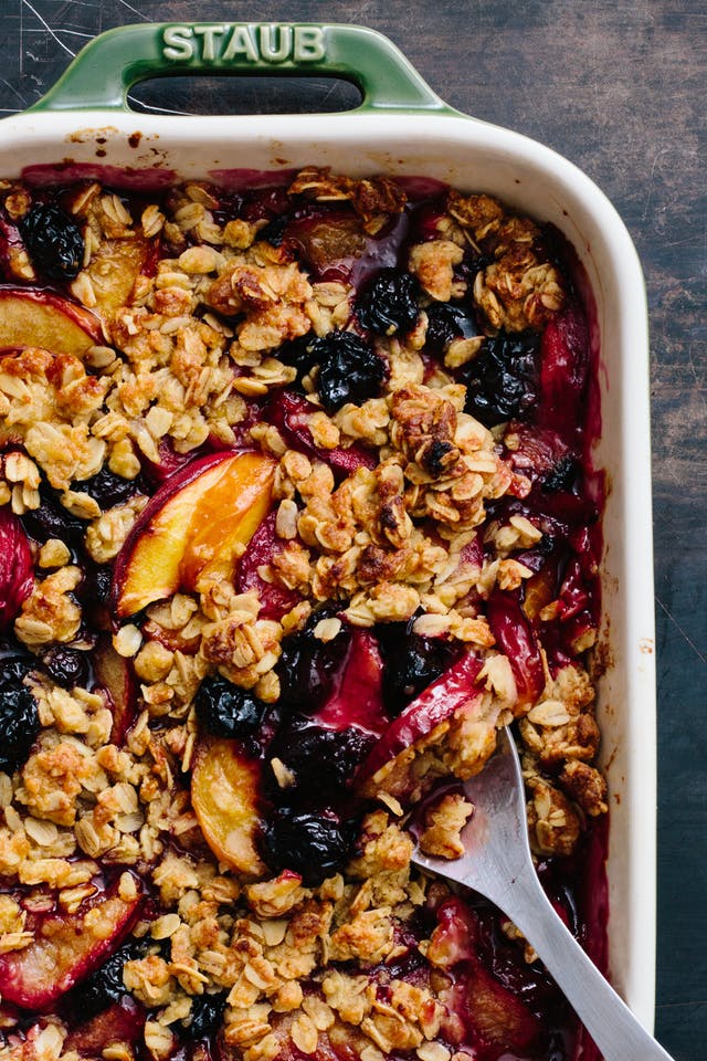 There's a reason pies, crisps, and cobblers are particularly popular in the summer. Every one of them is a delicious go-to solution for making the most of ripe fruit. Check out this easy (and vegan!) blueberry crisp , courtesy of the cooks at Stone Pier Press. (Photo by Kitchn)