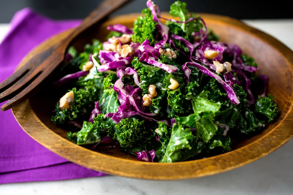 Photo Source . This salad contains completely fresh ingredients, along with some hearty seeds. They add a little crunch and provide a good amount of protein. The lightly dress final product is full of color - the perfect compliment to a plate of pasta, fried rice, or any other starchy main dish.