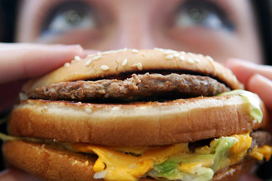 New reports describe how food choices and farming practices can exacerbate climate change, and they argue for changes and even an international treaty. Investors are also calling for greenhouse gas reductions from the fast-food industry. Credit: Cate Gillon/Getty Images