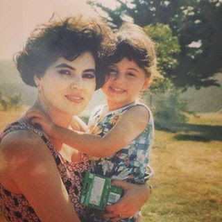 The author at age five, and her mom.