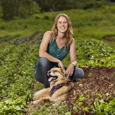 Acadia Tucker takes a break with Nimbus, who gets free rein of the farm. Image source: Micheal Winters Photography