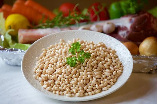 This soup is perfect for a cold winter night. It has a bit of a citrus zing and some spice, but is also incredibly soothing. The navy beans, which are partially pureed, add mellow earthy notes to a simple base of roots vegetables and herbs. The final product tastes best when your ingredients are fresh, so don't hesitate to begin this one with a homemade veggie stock. Photo source: Pixabay .