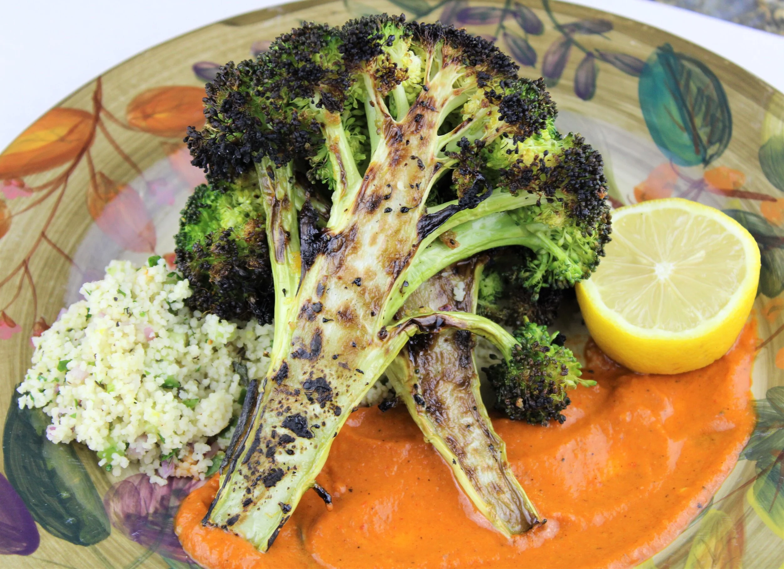 Garlic-Roasted Broccoli Steaks with Couscous &amp; Harissa 