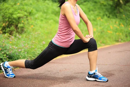50528994_S_runner_female_stretching_sneakers_lunge.jpg