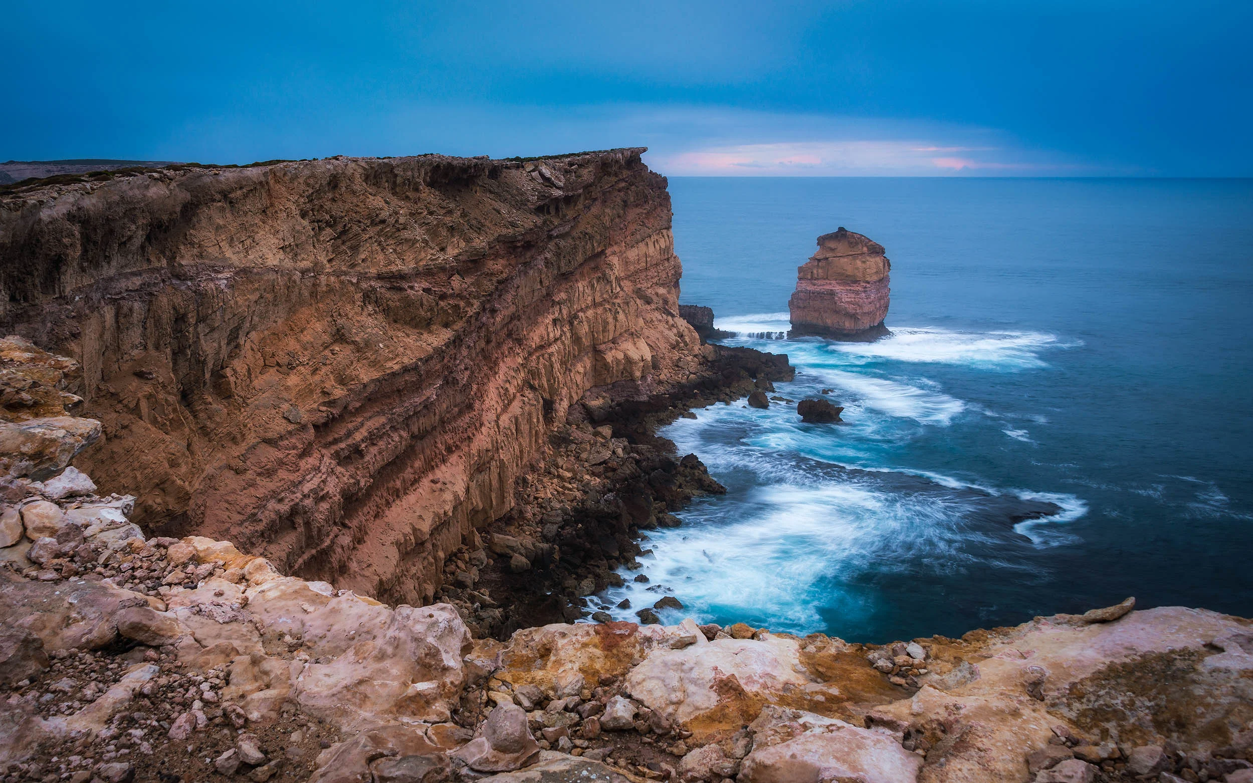 Awesome layering in the cliff face along with a lone sea stack at Leo Cummings Lookout.