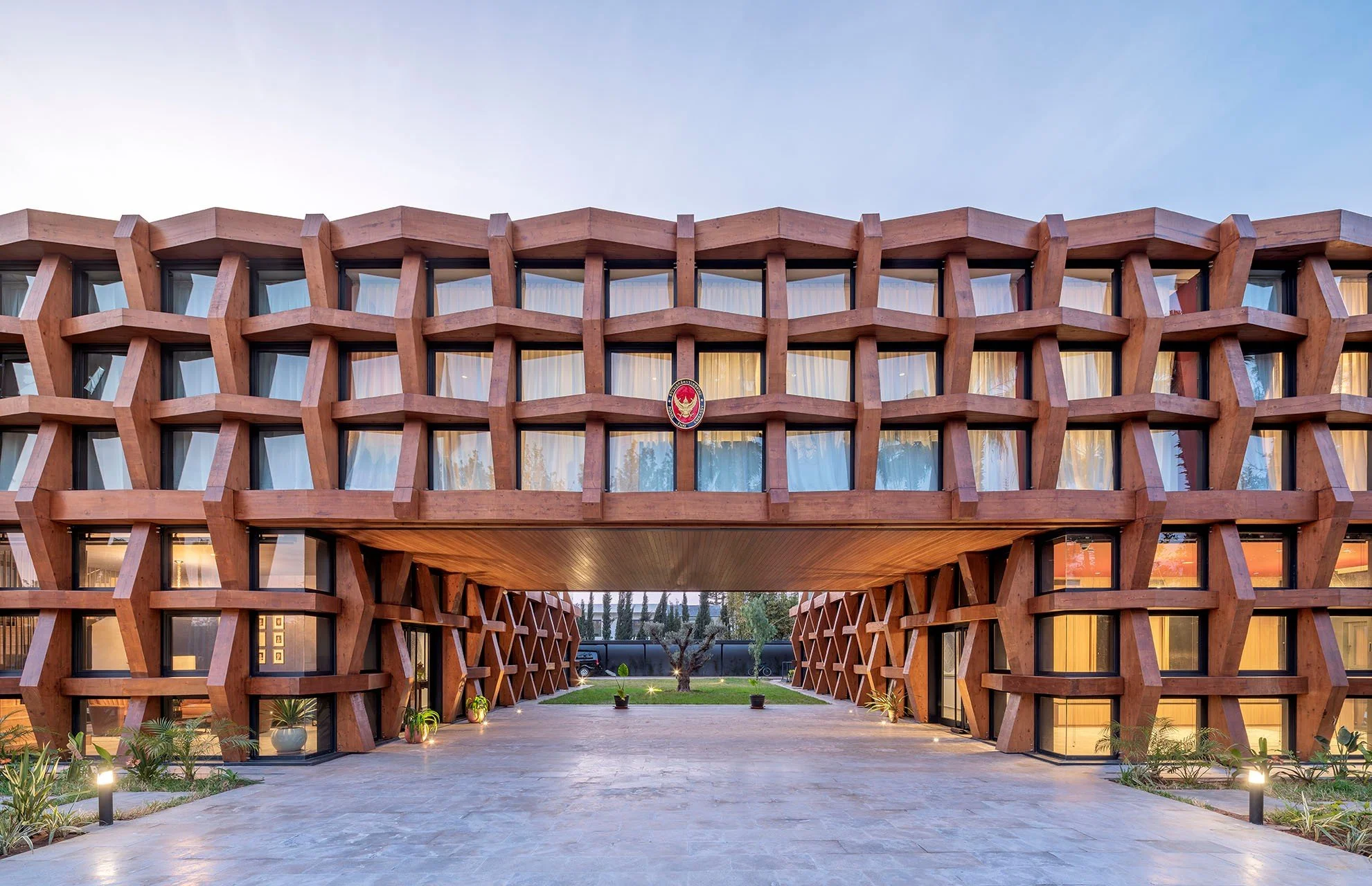 The new Thai embassy replaces the existing building to better meet the challenges of its diplomatic mission.

The embassy&rsquo;s wooden fa&ccedil;ade is inspired by traditional Thai architecture and Moroccan geometric woodwork patterns. The ancestra