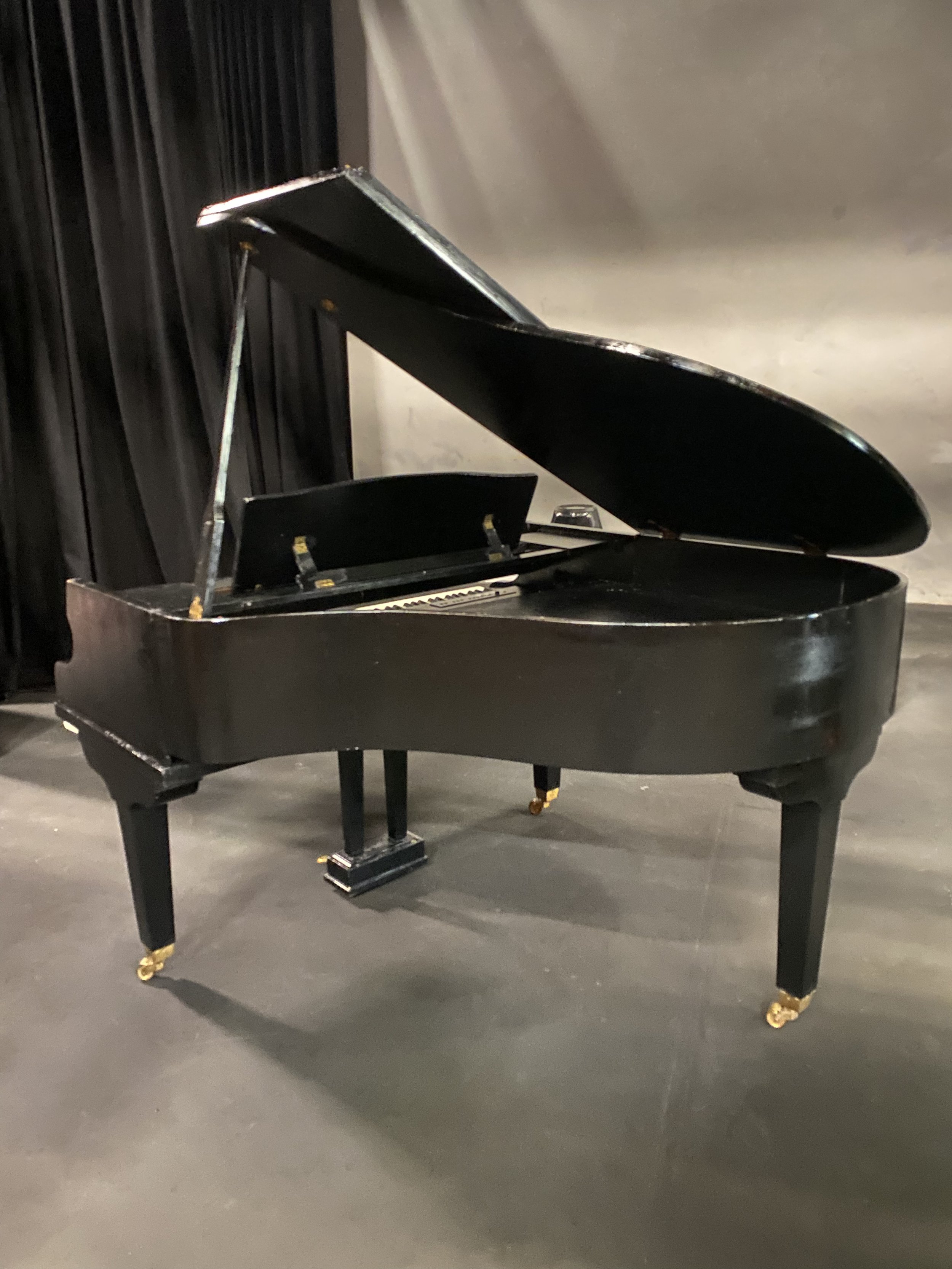 Baby grand piano shell hire with lid open