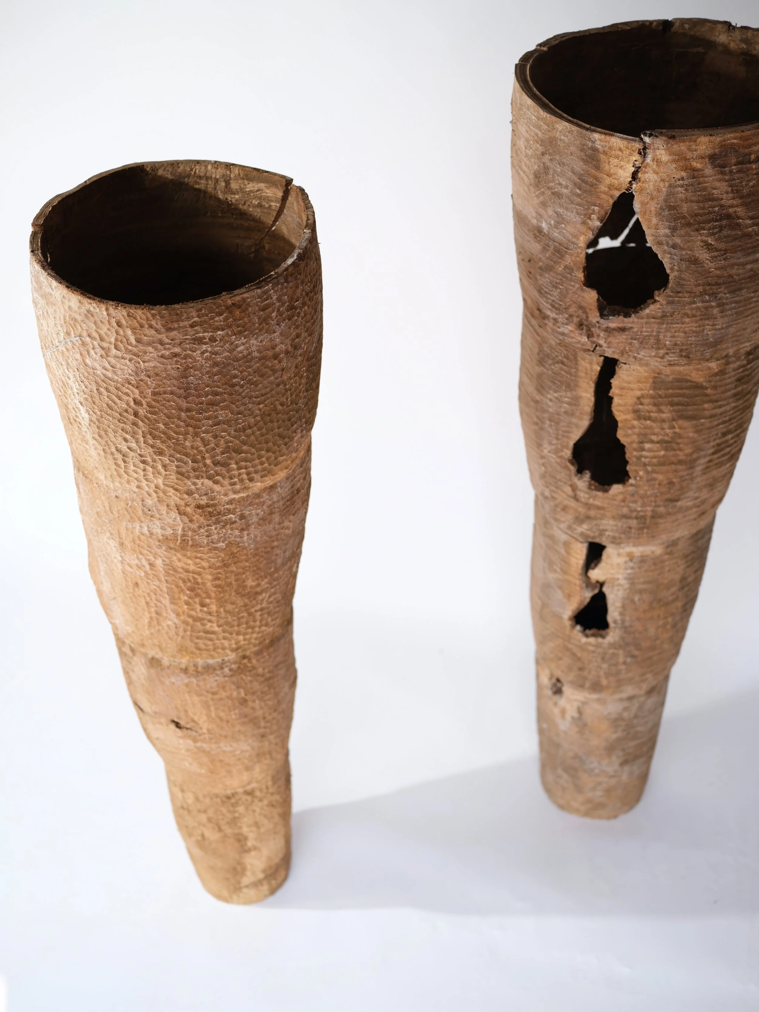 Two extruded Oak vessels. 1.8m tall